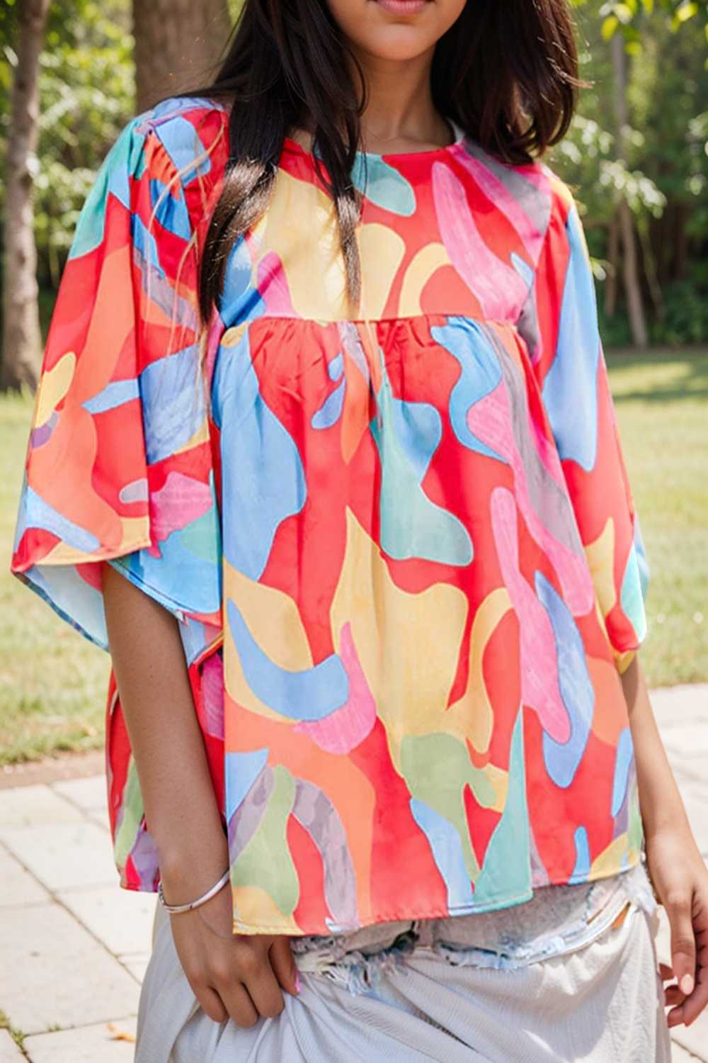 vibrant abstract print flowy sleeve round neck top